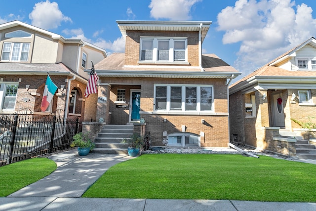 view of front of home with a front yard