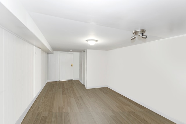 basement featuring light wood-type flooring