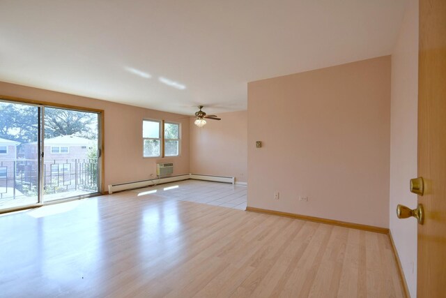 8545 Arnold St Unit 3Se, River Grove, IL 60171 - unfurnished room with light wood finished floors, a ceiling fan, and baseboards