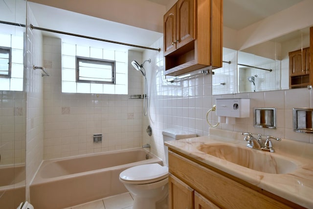 8545 Arnold St Unit 3Se, River Grove, IL 60171 - full bath with shower / washtub combination, toilet, vanity, tile patterned flooring, and a baseboard heating unit