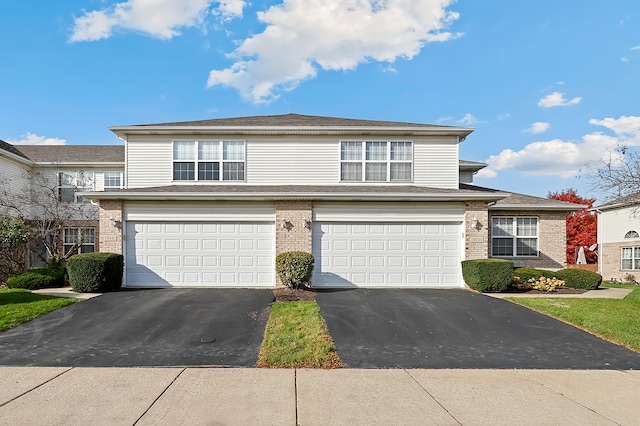 front of property featuring a garage