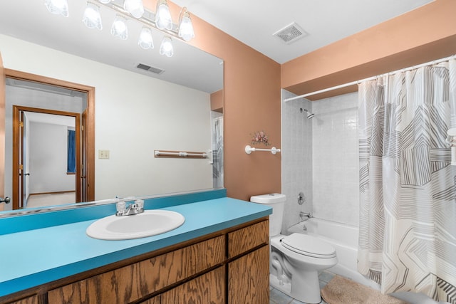 full bathroom with vanity, shower / bath combo with shower curtain, toilet, and tile patterned flooring