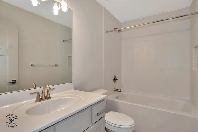 full bathroom featuring shower / bath combination, vanity, and toilet