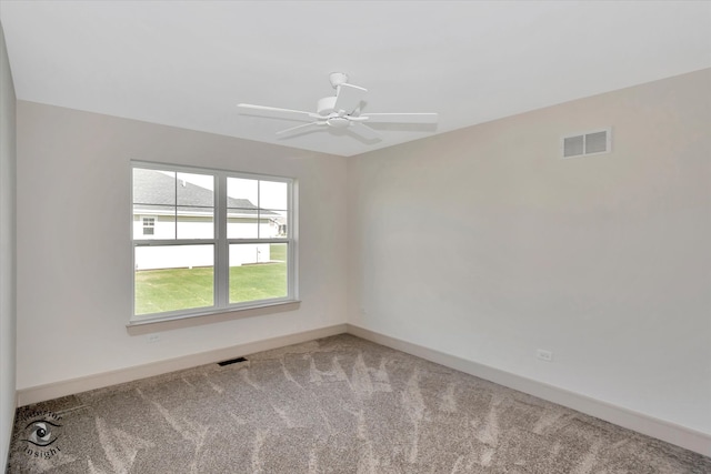 empty room with carpet and ceiling fan