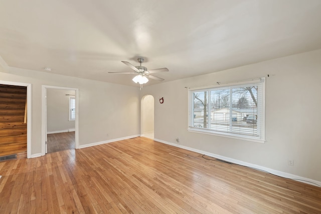 empty room featuring ceiling fan and light wood-type flooring