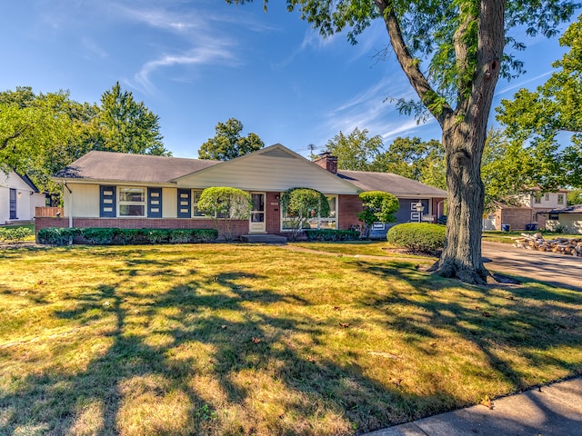 ranch-style house with a front lawn