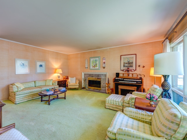 carpeted living room featuring a stone fireplace and ornamental molding