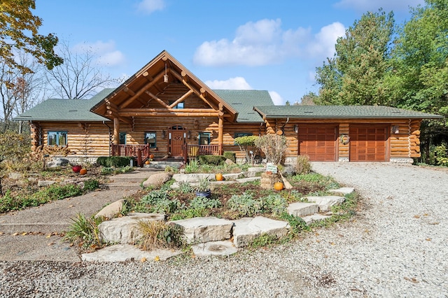 log cabin with a garage