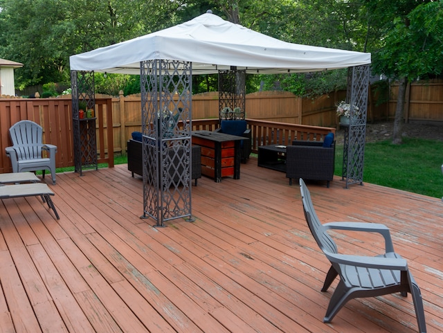 wooden terrace with a gazebo