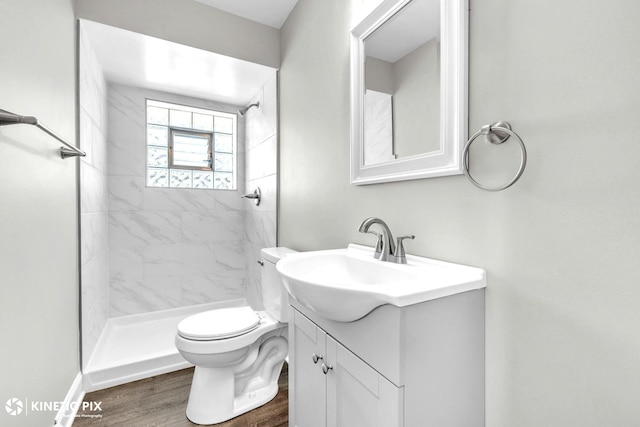 9036 Walnut Ave, Franklin Park, IL 60131 - full bath featuring vanity, a shower stall, toilet, and wood finished floors