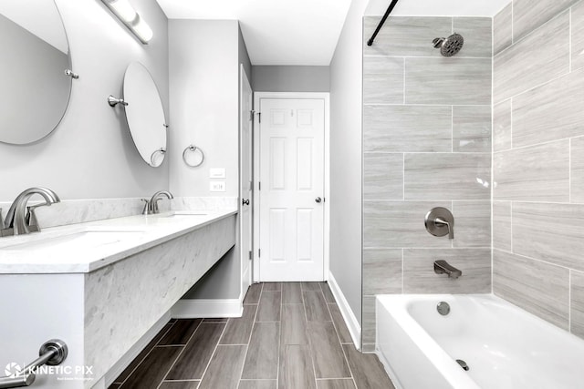 9036 Walnut Ave, Franklin Park, IL 60131 - bathroom with washtub / shower combination, double vanity, baseboards, and wood finish floors