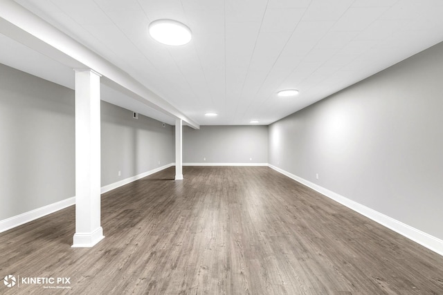 9036 Walnut Ave, Franklin Park, IL 60131 - finished below grade area featuring wood finished floors and baseboards