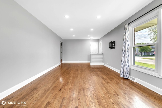 9036 Walnut Ave, Franklin Park, IL 60131 - unfurnished room featuring recessed lighting, baseboards, and light wood finished floors