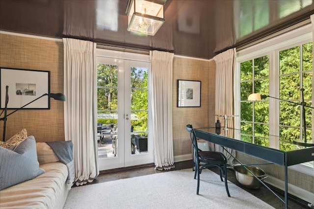 doorway to outside with french doors and carpet flooring