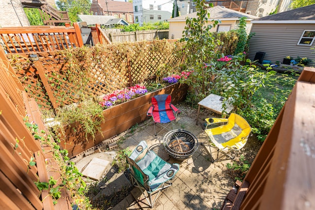 view of patio / terrace with a fire pit