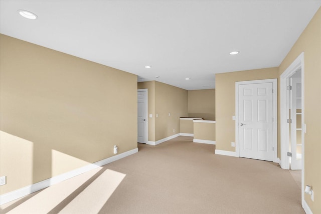 1709 Brighton Ct, Champaign, IL 61822 - unfurnished room featuring light carpet, baseboards, and recessed lighting