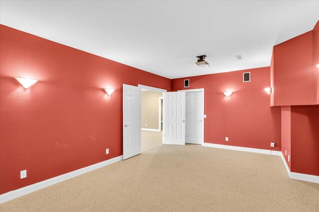 1709 Brighton Ct, Champaign, IL 61822 - unfurnished room with baseboards and light colored carpet