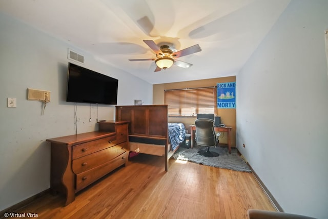 bedroom with ceiling fan and hardwood / wood-style floors