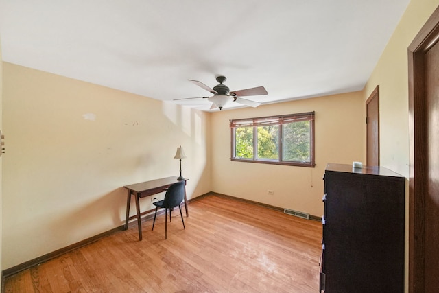 interior space with ceiling fan and light hardwood / wood-style flooring