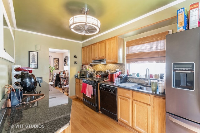 kitchen featuring ornamental molding, sink, tasteful backsplash, light hardwood / wood-style flooring, and black appliances