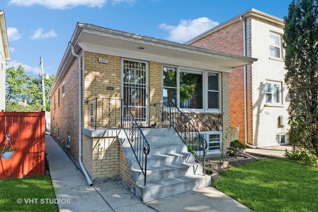 view of front of property with a front lawn