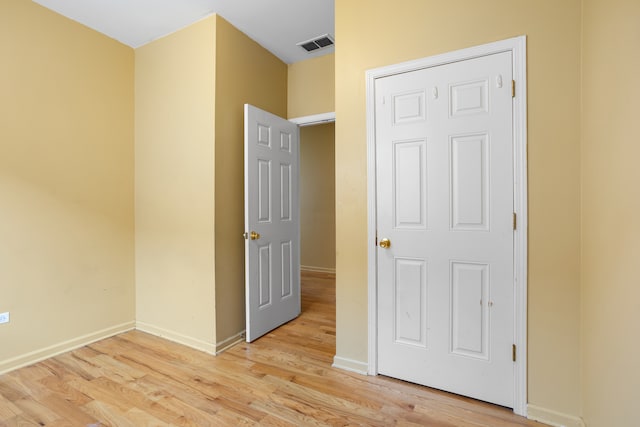 unfurnished bedroom featuring light hardwood / wood-style floors