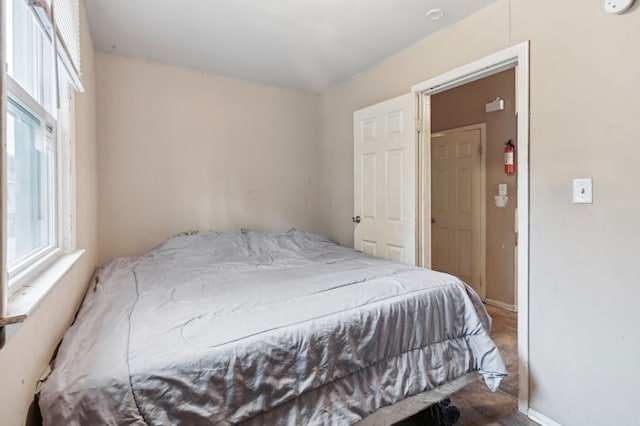 bedroom featuring wood-type flooring