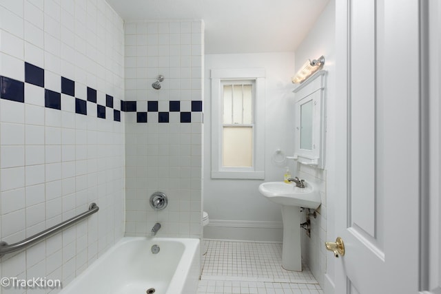 bathroom featuring tile patterned floors and toilet