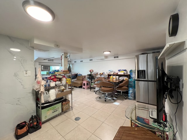 kitchen with light tile patterned flooring