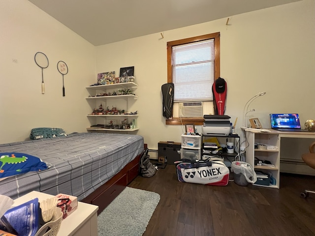 bedroom featuring cooling unit, a baseboard radiator, and dark hardwood / wood-style flooring