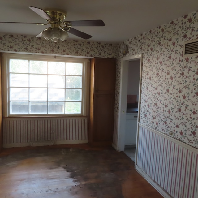 interior space with a closet, ceiling fan, and hardwood / wood-style floors