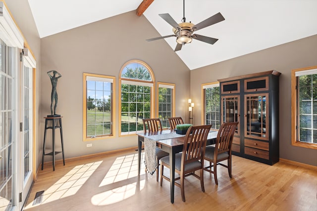 dining space with beam ceiling, french doors, light hardwood / wood-style floors, and ceiling fan