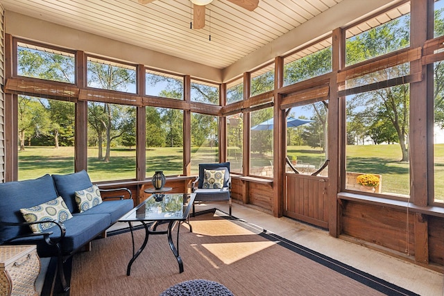 sunroom / solarium with ceiling fan