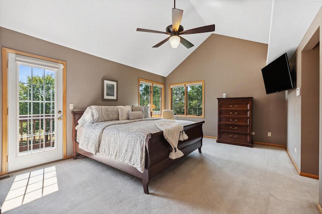 bedroom with high vaulted ceiling, ceiling fan, light colored carpet, and access to outside