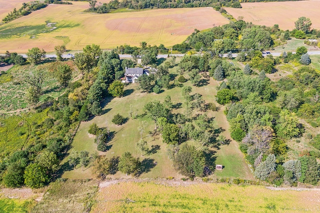 birds eye view of property featuring a rural view