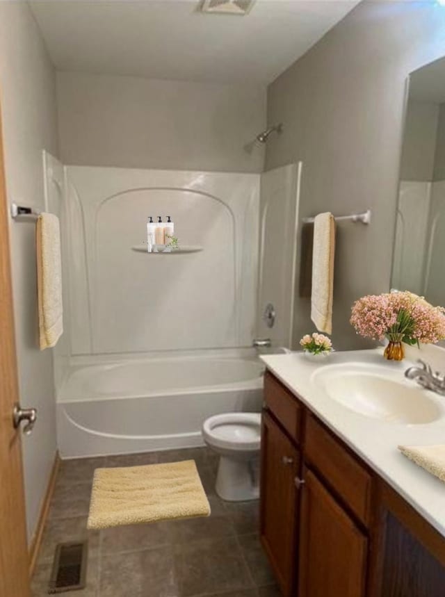 full bathroom featuring visible vents, tile patterned floors, vanity, toilet, and washtub / shower combination