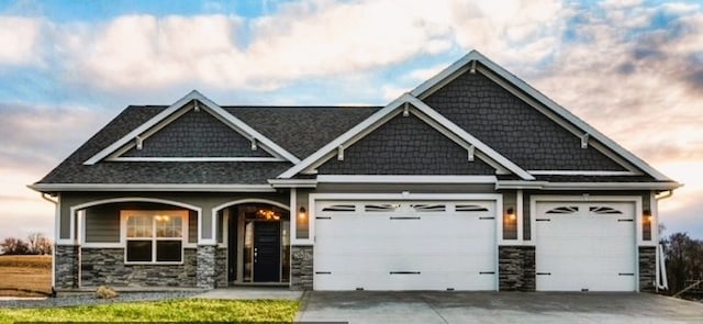 craftsman-style home with a garage