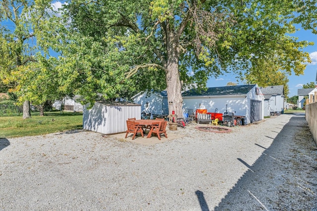 exterior space with a storage shed