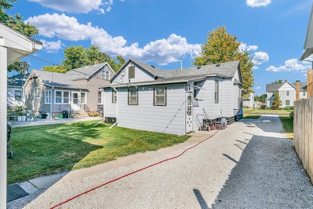 exterior space with a front lawn