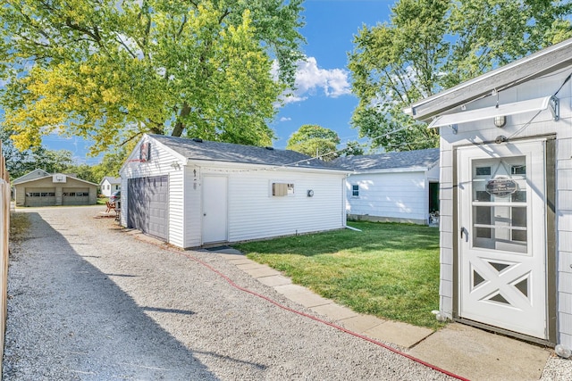 garage with a yard