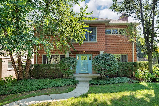 view of front of property with a front lawn