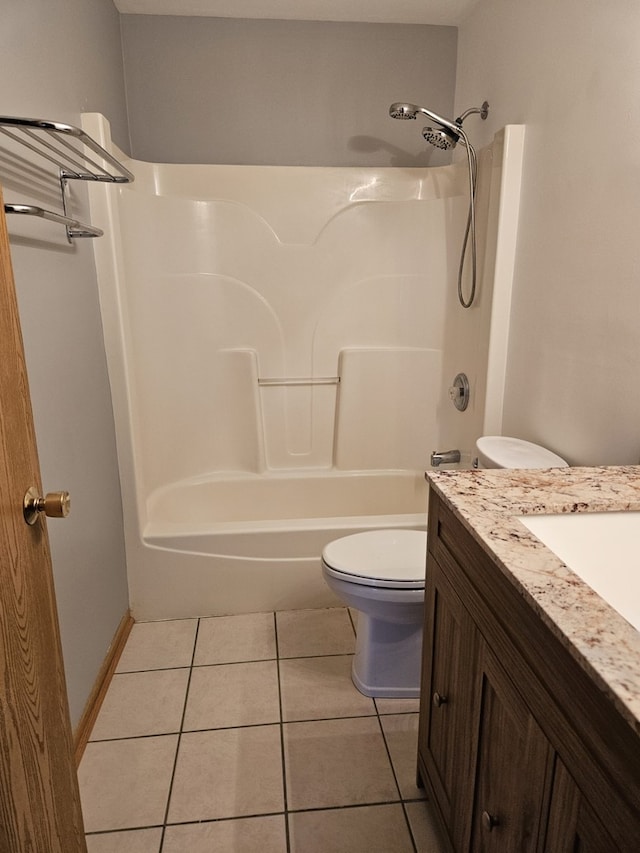 full bathroom with vanity, toilet, washtub / shower combination, and tile patterned floors