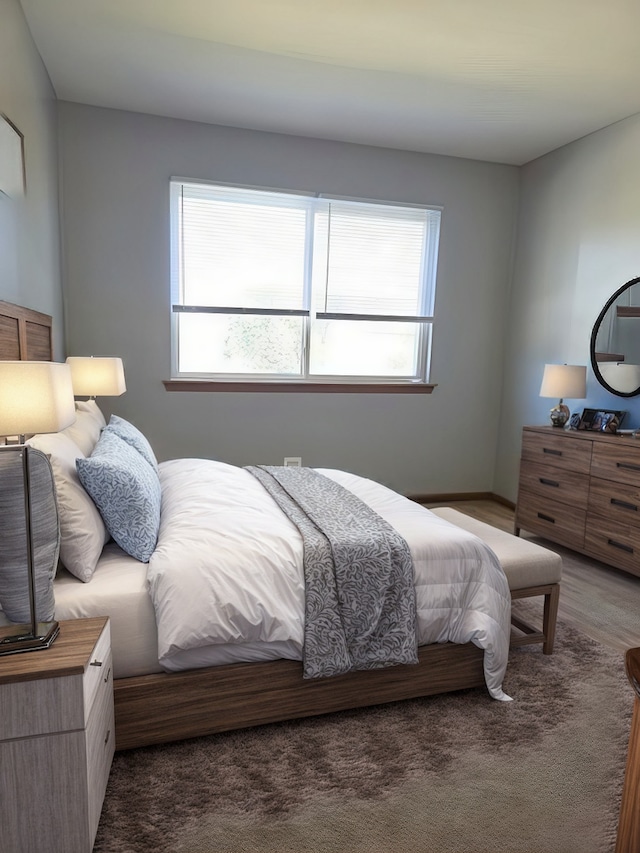 bedroom featuring hardwood / wood-style floors