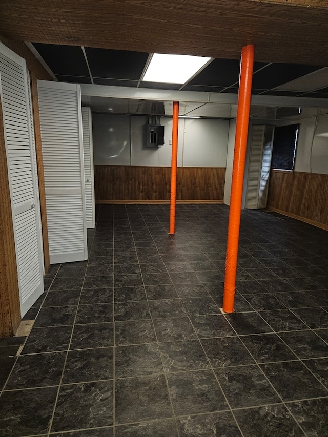 basement with wood walls