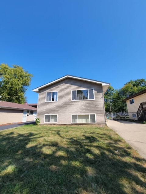 view of front of home with a front lawn