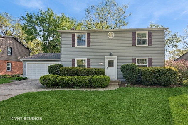 945 N Stark Dr, Palatine, IL 60074 - view of front of house featuring driveway, an attached garage, a front lawn, and entry steps