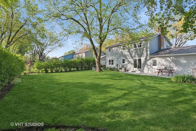 945 N Stark Dr, Palatine, IL 60074 - view of green lawn featuring a patio area