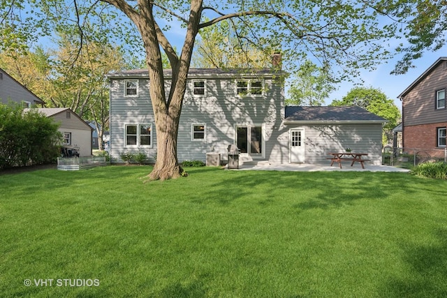 945 N Stark Dr, Palatine, IL 60074 - rear view of property featuring a chimney and a patio