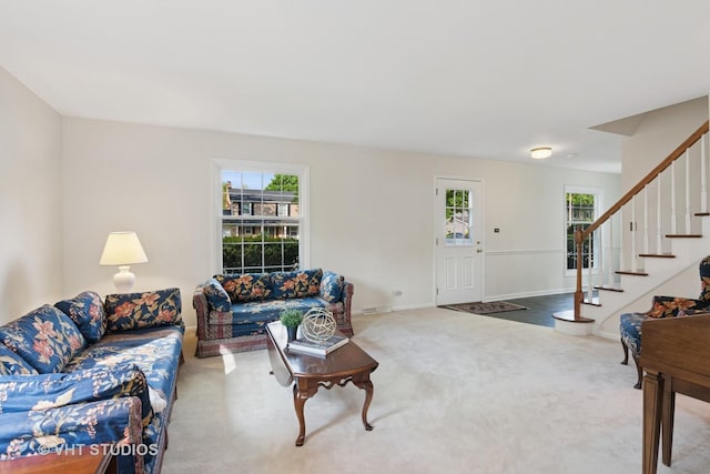 945 N Stark Dr, Palatine, IL 60074 - carpeted living room featuring healthy amount of natural light, stairway, and baseboards