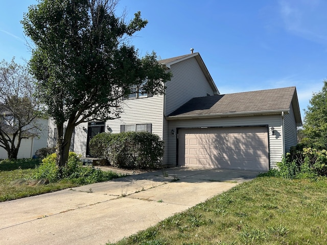 view of home's exterior with a yard and a garage